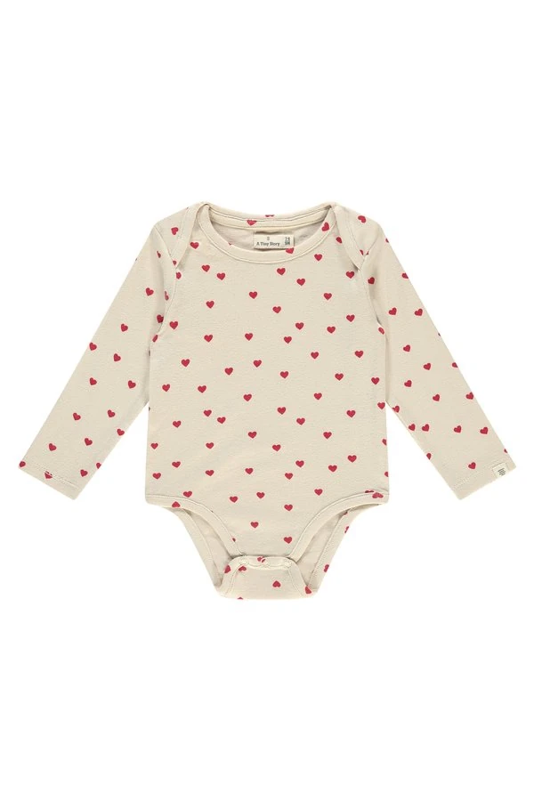 Babyromper met rode hartjes uit het officiële Wehkamp-aanbod